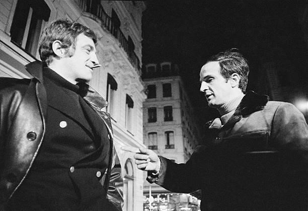 French actor Jean-Paul Belmondo and director Francois Truffaut on the set of the 1969 French film La Sirene du Mississipi .