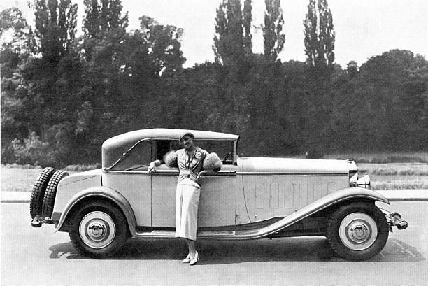 Josephine Baker . Photograph of American-born French dancer, singer, and actress next to her Letourneur & Marchand convertible, c.1931.