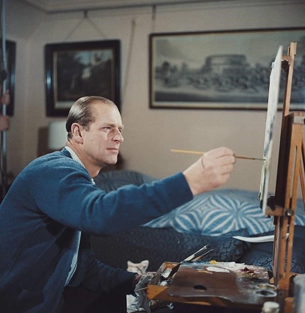 Prince Philip, Duke of Edinburgh pictured painting with oil colours at an easel during filming of the television documentary 'Royal Family' in London...