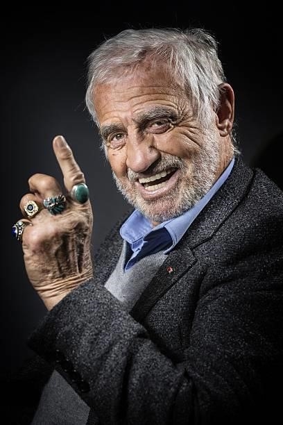 French actor Jean-Paul Belmondo poses during a photo session in Boulogne-Billancourt, outside Paris, on December 5, 2016. / AFP / JOEL SAGET