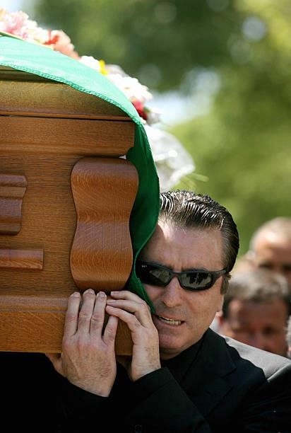 The coffin of singer and actress Rocio Jurado is being carried, amongst others by her widower Jose Ortega Cano, 02 June 2006 in Chipiona, southern...