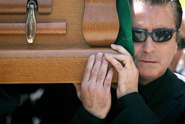 The coffin of singer and actress Rocio Jurado is carried by her widower Jose Ortega Cano to the sanctuary of the 'Virgen de Regla', 02 June 2006...