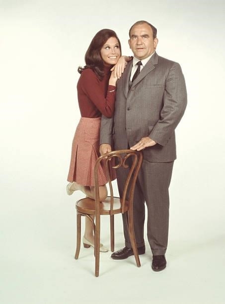 American actors Mary Tyler Moore, as Mary Richards, and Ed Asner, as Lou Grant, pose for a publicity photo for the CBS situation comedy 'Mary Tyler...