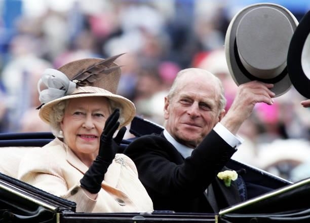 Queen Elizabeth II , The Queen, and husband Prince Philip, the Duke of Edinburgh, arrive in the Royal Carriage on the third day of Royal Ascot 2005,...
