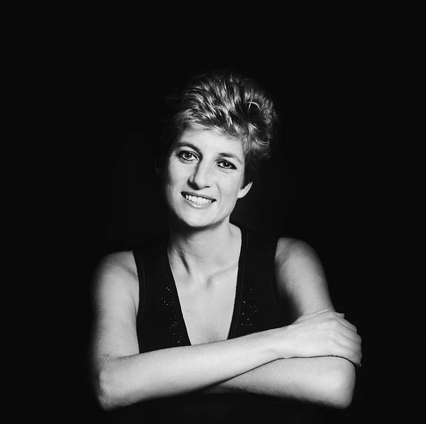 Princess Diana, Princess of Wales posing against a dark background, circa 1995.