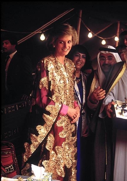 The Princess of Wales at the museum in Kuwait City, March 1989. She is wearing a gold embroidered bedouin gown that was presented to her with a...