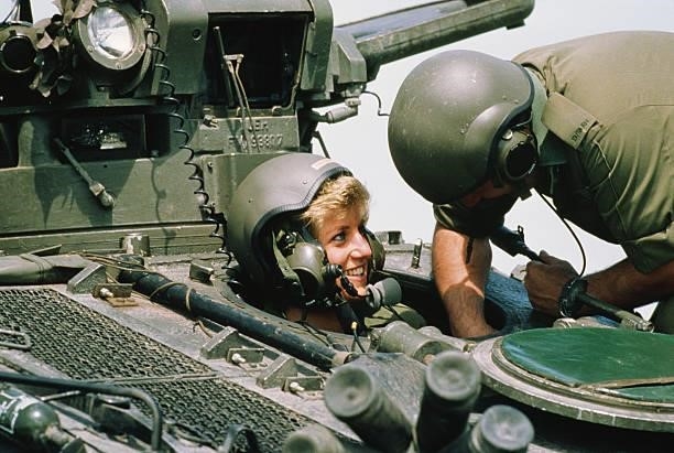 Princess Diana driving an armoured vehicle with the Royal Hampshire Regiment at Tidworth, Hampshire, 23rd June 1988.