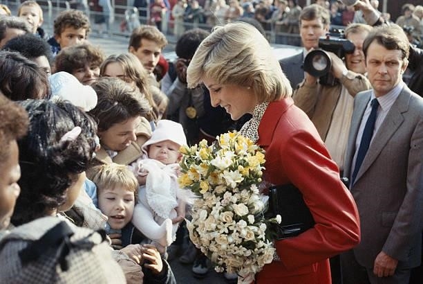 Princess Diana wearing a Jasper Conran suit during a visit to a community centre in Brixton, October 1983.
