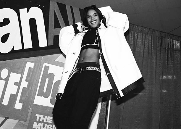 American R&B singer Aaliyah, aka Aaliyah Dana Houghton poses for a photo backstage at Madison Square Garden for Lifebeat's Urban Aid benefit concert...