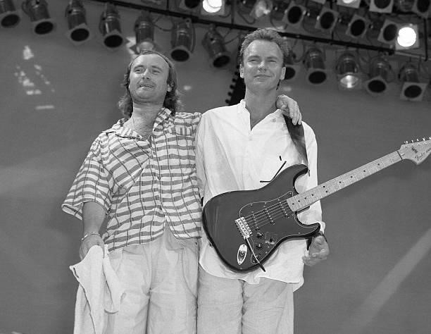 Photo of STING, w/ Phil Collins at Live Aid