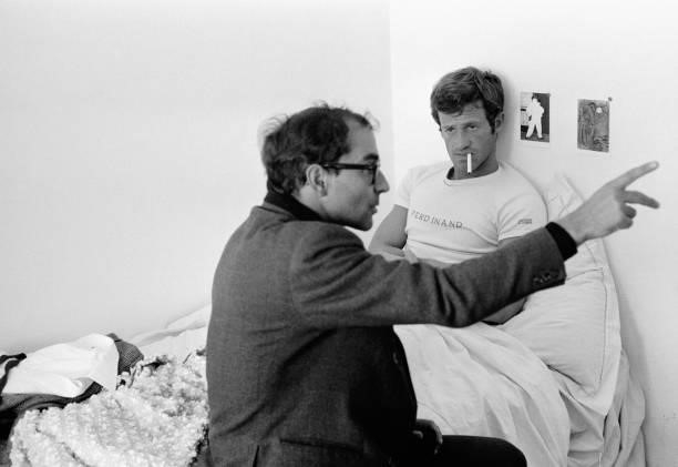 Jean-Luc Godard directs actor Jean-Paul Belmondo as Ferdinand "Pierrot