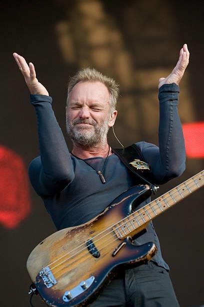 Photo of POLICE and STING, Sting performing live onstage