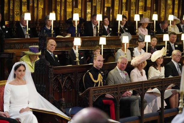 Meghan Markle in St George's Chapel, Windsor Castle for her wedding to Prince Harry watched by Queen Elizabeth II, Duke of Edinburgh, Earl of Wessex,...